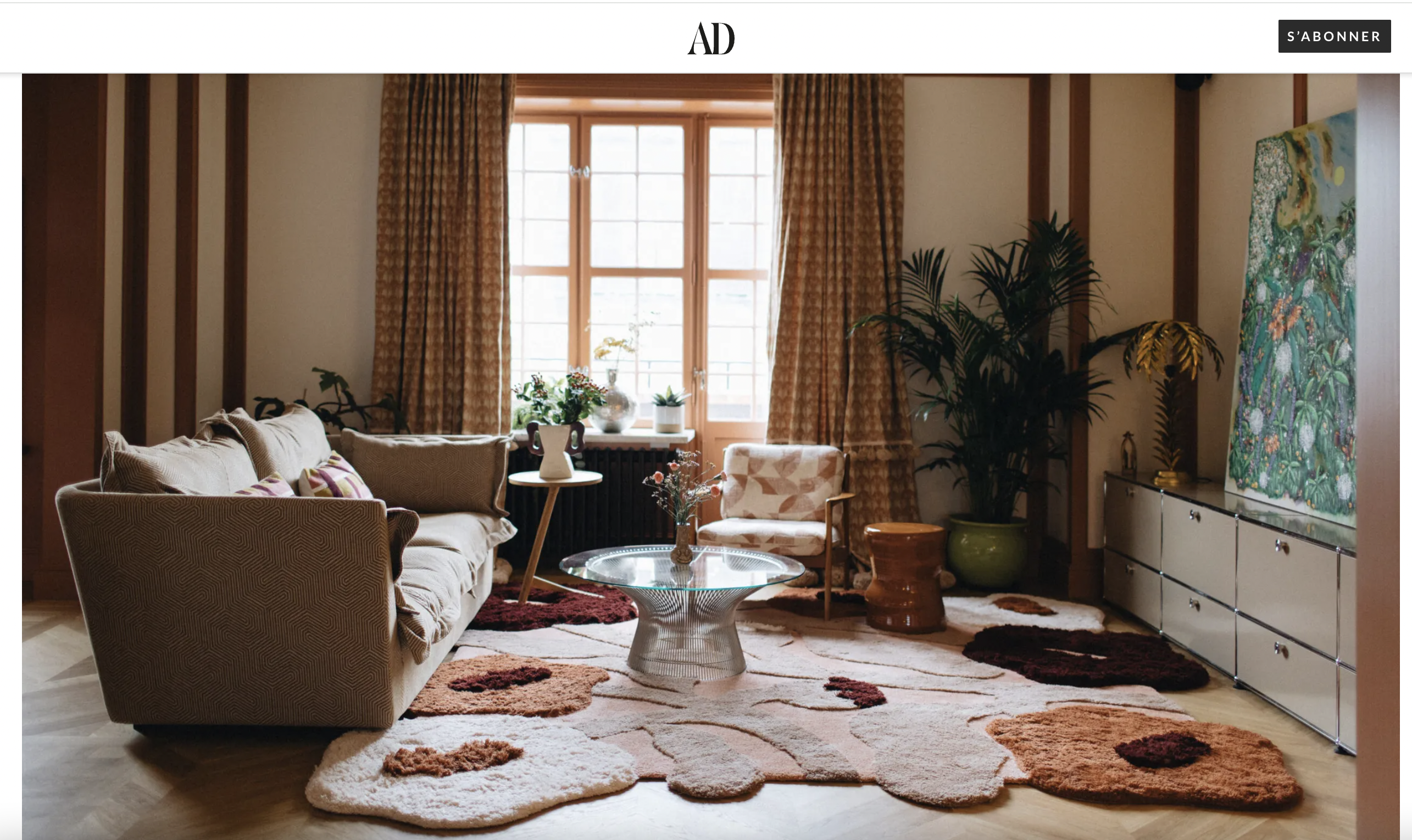 Interior design by Madelen Möllard featured in Architectural Digest. Featuring poppy rug and poppy vase